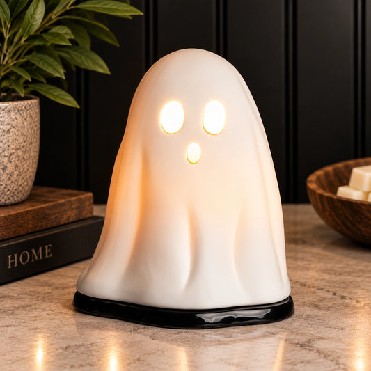 White ceramic Ghost Wax Warmer for Halloween décor by Mustard Seed Mountain